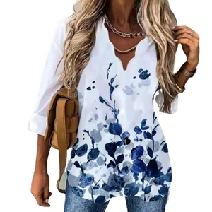 White long sleeve blouse for women with blue floral print and scalloped V-neck