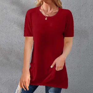 Close-up of women's red loose round neck T-shirt with functional pocket details