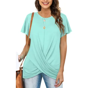 Close-up detail of mint green crew neck T-shirt featuring a unique front twist knot