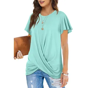 Close-up detail of mint green short sleeve T-shirt with stylish front twist knot
