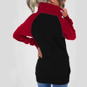Back view of women's oversized red and black color block fleece sweatshirt with high neck