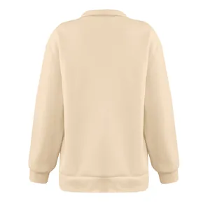 Vista posteriore dettagliata di una felpa minimalista color albicocca con mezza zip da donna