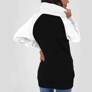 Back view of women's black and white color-block fleece-lined hoodie sweatshirt