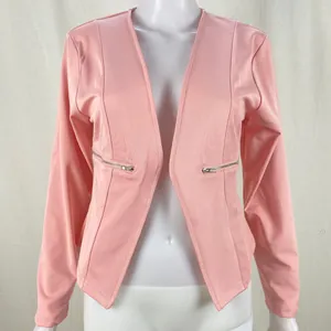 Detailed view of women's pink casual blazer featuring stylish silver zipper pockets