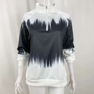 Black and white gradient print half-zip sweatshirt for women with long sleeves and ribbed cuffs