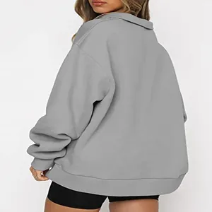 Back view of a casual loose-fitting gray long-sleeve sweatshirt for a cozy autumn look