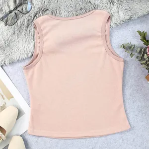 Detailed view of pink waffle knit tank top with soft texture and U-neck design