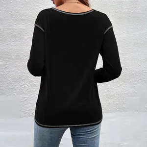 Back view of a black long-sleeve T-shirt featuring grey contrast stitching details.