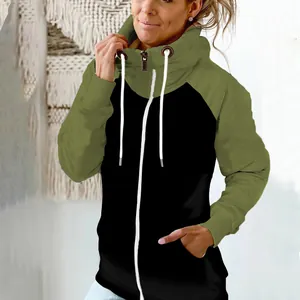 Detail of two-tone olive green and black zip-up hoodie with high neck and drawstrings