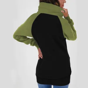 Detail view showing the back design of a womens color block hoodie in olive green and black