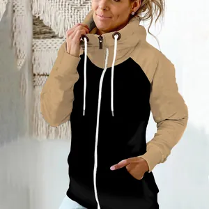 Detailed view of women's color-block fleece hoodie with high neck zipper and drawstrings