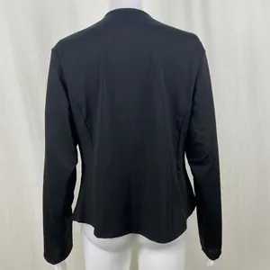 Detailed back view of a classic black casual blazer jacket for women featuring slim fit design