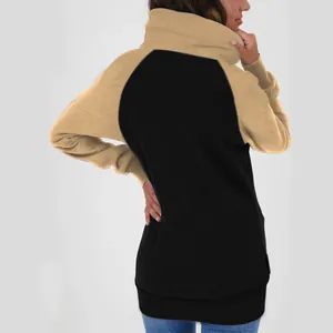Back view of a two-tone oversized fleece hoodie in black and khaki, thick for winter.