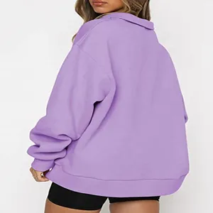 Back view of a comfortable women's purple half-zip sweatshirt with cozy fleece lining