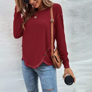 Dark red irregular hem long sleeve T-shirt with button detail and white stitching