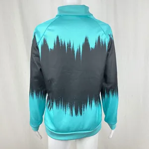 Back view of a turquoise and black gradient print sweatshirt with a half-high neck.