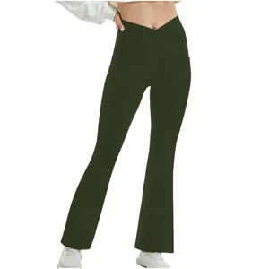 Stylish women's high-waisted crossover flare yoga pants in deep green with bootcut fit