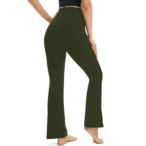 Rear view of high-waisted dark green flared yoga pants showing a slim fit silhouette