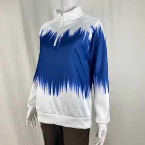 Detail of a women's half-zip sweatshirt with a blue and white gradient print.