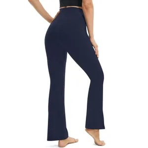Back view of high-waisted navy blue flare yoga pants with slim fit and bootcut hem.