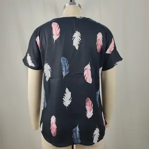 Detailed back view of a black short sleeve blouse with colorful pink and white feather print