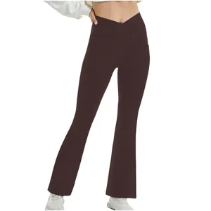 Premium high-waisted crossover flare yoga pants in solid dark brown for women