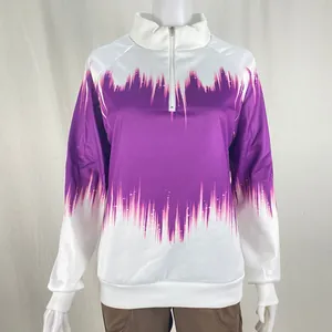 Close-up of women's purple gradient sweatshirt with half-zip collar detail