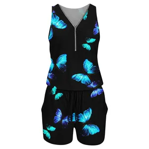 Close-up of black sleeveless romper with vibrant blue butterfly prints and zipper V-neck