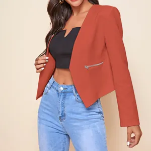 Detailed view of a modern women's rust orange cropped blazer featuring a metal zipper