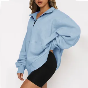 Felpa da donna azzurra con mezza zip e maniche lunghe con polsini a costine eleganti