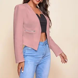 Close-up of women's pink cropped blazer with silver zipper details