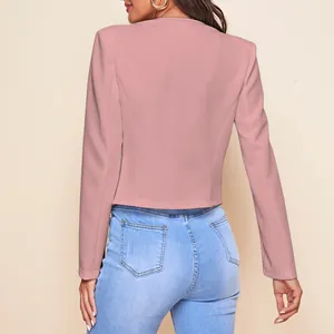 A stylish pink blazer jacket for women shown from the back view with blue denim jeans