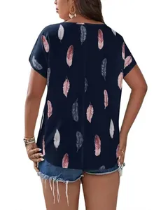 Rear view of plus size dark blue blouse featuring pink feather print and casual fit