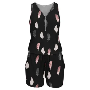 Detail view of sleeveless V-neck romper with pink feather print and front zipper.