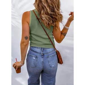 Back view detail of a casual green waffle knit tank top paired with blue denim jeans