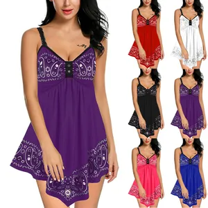 Sleeveless paisley print strap mini dress with irregular hem shown in six vibrant colors