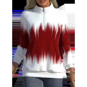 Detail view of women's half-zip sweatshirt featuring a white and red gradient print style