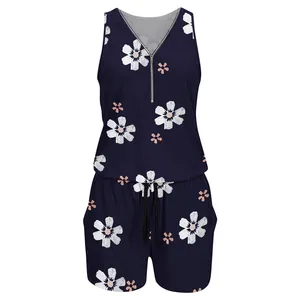 Detail of women's navy floral sleeveless romper with zipper neck and drawstring waist.