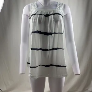 Front view of women's pleated square neck tank top with black stripes on mannequin