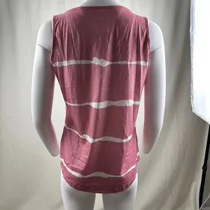 Back view of pink sleeveless top featuring white horizontal tie-dye stripes and curved hem