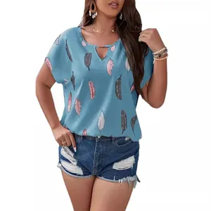 Women's plus size light blue short sleeve V-neck blouse featuring vibrant feather prints