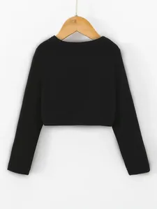 Back detail of women's black cropped shrug jacket with elegant textured fabric finish