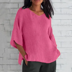 Loose V-neck fuchsia pink cotton linen blouse top shown on model