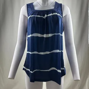 Front view detail of a blue and white striped square neck tank top with pleats.