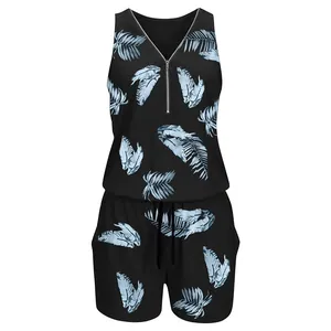Front view of sleeveless black romper with blue leaf print and zipper detail