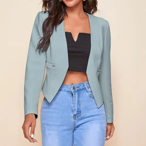 Close-up of a casual light blue blazer for women with decorative silver zippers