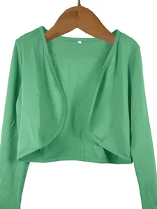 Detailed view of an elegant green cropped bolero shrug cardigan on a wooden hanger for women