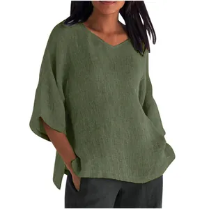 Loose-fit green V-neck linen-texture blouse with half sleeves and side slit detail