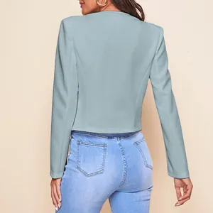 Back view of a light blue cropped blazer for women showing slim fit design and clean cut