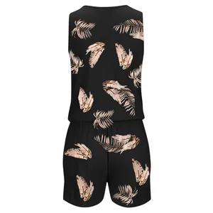 Black summer romper for women featuring elegant tropical leaf prints on soft fabric.